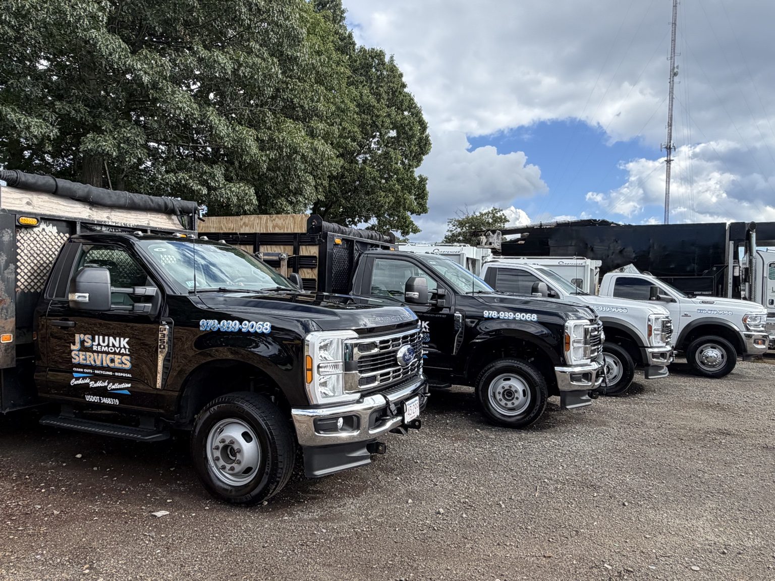 J’s Junk Services truck fleet serving the North Shore of Massachusetts